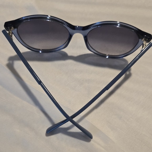 MAX&CO SUNWEAR
MO0084 87W - SHINY TURQUOISE / SHINY LIGHT BLUE Size: 55:18:140MM - Picture 8 of 11